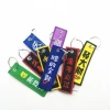 Double-sided embroidered LOGO lockstitch twill fabric keychain, car, motorcycle and motorcycle luggage tag details Picture